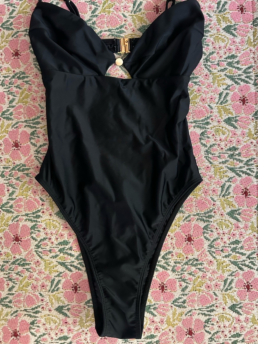 Black V-Neck One-Piece Swimsuit with Gold Accent